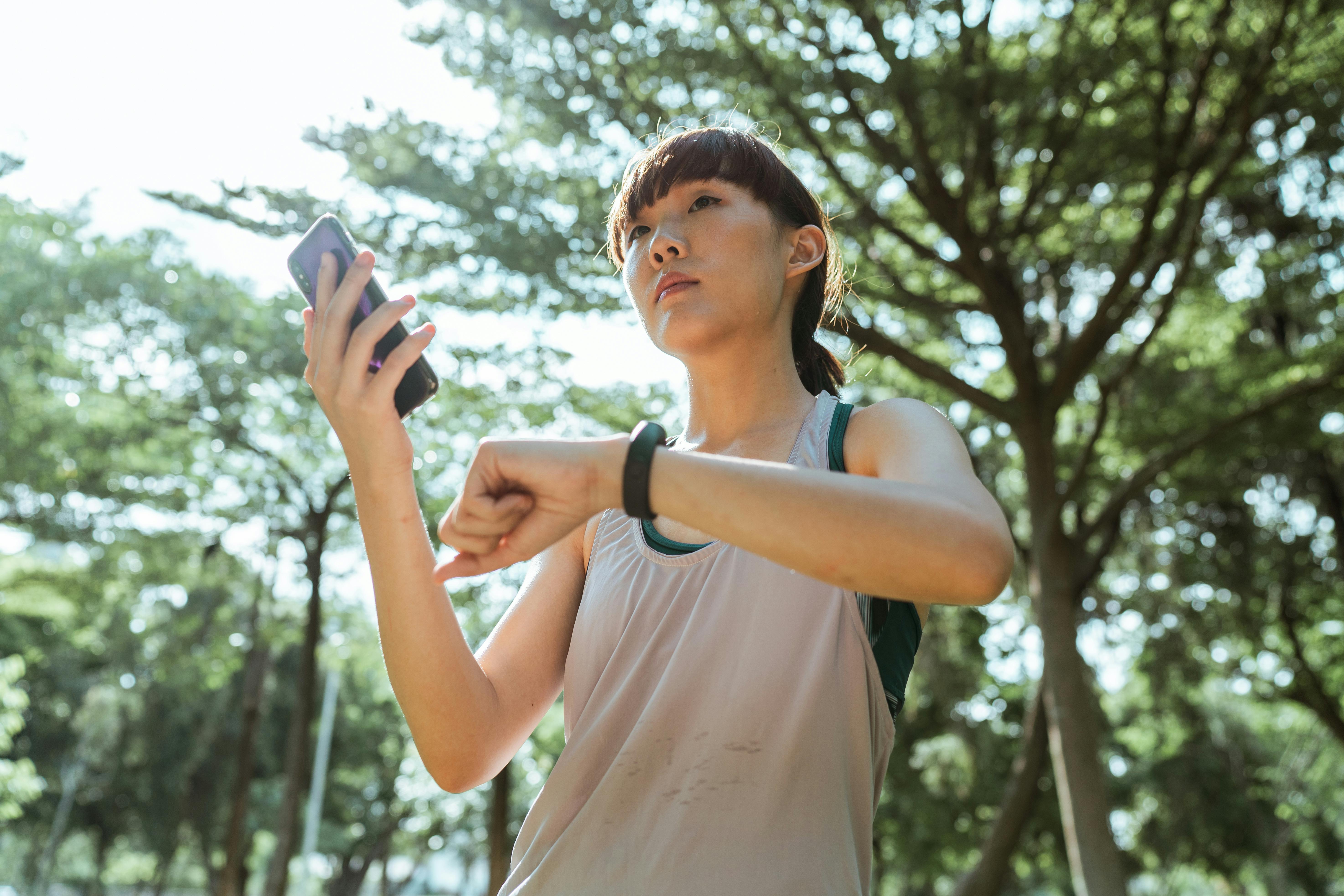 Runner checking running watch