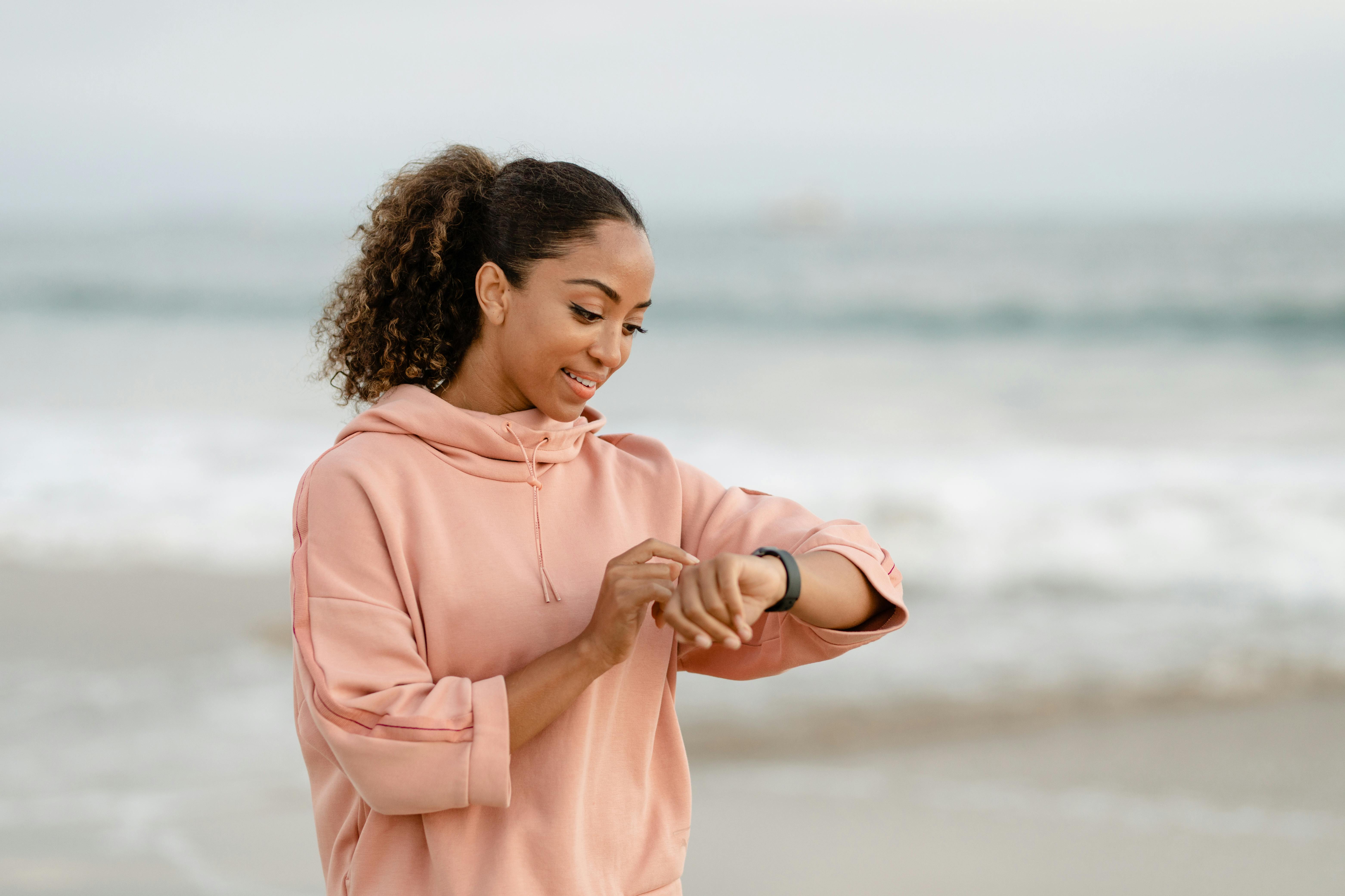 Runner looking at watch during run
